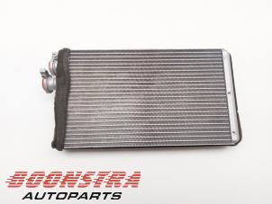 Usados Radiador de calefactor Audi A5 Precio € 109,95 Norma de margen ofrecido por Boonstra Autoparts