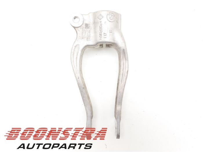 Lower shock bracket