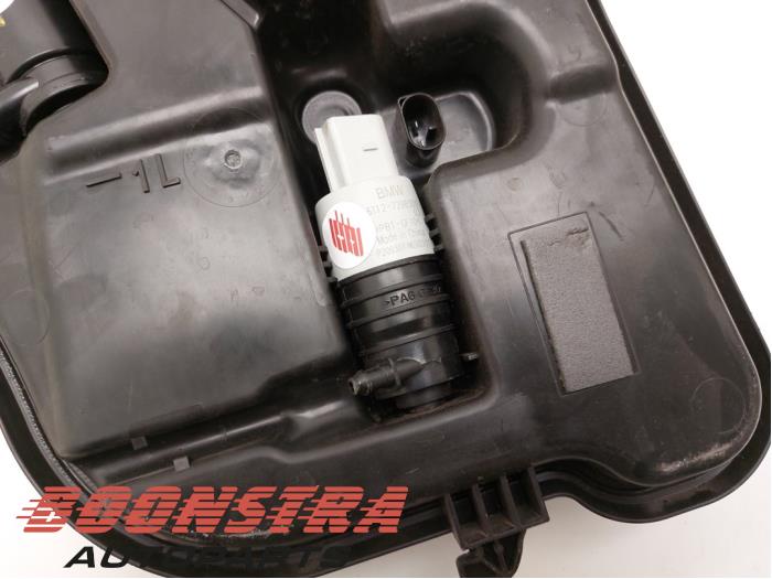 Front windscreen washer reservoir from a BMW M8 Gran Coupe (G16) M8 Competition 4.4i V8 32V 2021
