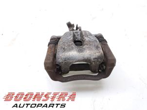 Used Rear brake calliper, right Mini Clubman (R55) 1.6 16V Cooper Price € 24,95 Margin scheme offered by Boonstra Autoparts