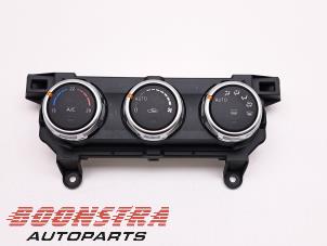 Używane Panel sterowania nagrzewnicy Mazda CX-3 2.0 SkyActiv-G 120 Cena € 79,95 Procedura marży oferowane przez Boonstra Autoparts