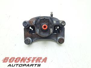 Used Front brake calliper, right Mitsubishi Space Star (A0) 1.0 12V Price € 24,95 Margin scheme offered by Boonstra Autoparts