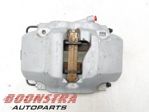 Used Front brake calliper, right BMW 5 serie Touring (G31) 530e xDrive 2.0 Turbo 16V Price € 174,95 Margin scheme offered by Boonstra Autoparts