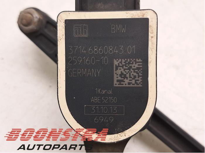Régulateur d'hauteur Xenon d'un BMW 1 serie (F21) 114i 1.6 16V 2014