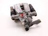 Rear brake calliper, left from a Kia Cee'd Sportswagon (JDC5) 1.0i T-GDi 12V 120 2018