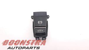 Used Parking brake switch BMW 5 serie (F10) 550i V8 32V TwinPower Turbo Price € 24,95 Margin scheme offered by Boonstra Autoparts