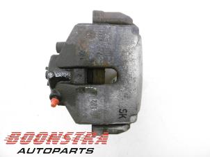 Used Front brake calliper, right Volkswagen Golf Plus (5M1/1KP) 1.6 TDI 16V 105 Price € 36,75 Margin scheme offered by Boonstra Autoparts