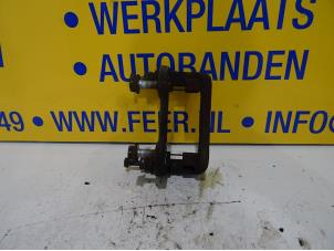 Used Rear brake calliperholder, left BMW 3 serie (E90) 318i 16V Price € 15,00 Margin scheme offered by Autobedrijf van der Feer