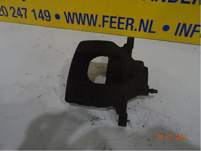 Front brake calliper, left from a Toyota Aygo (B10) 1.0 12V VVT-i 2007