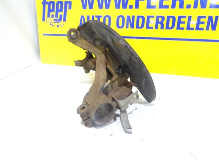 Knuckle bracket, front left from a Volkswagen Golf VII (AUA) 1.6 TDI BlueMotion 16V 2014