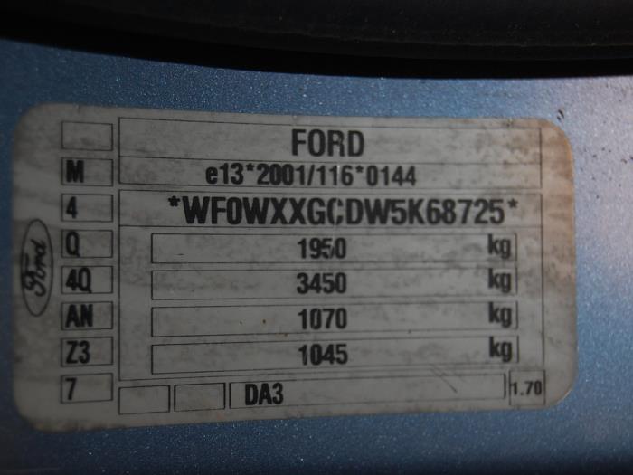 Uchwyt drzwi prawych przednich wersja 4-drzwiowa z Ford Focus 2 Wagon 1.8 TDCi 16V 2005
