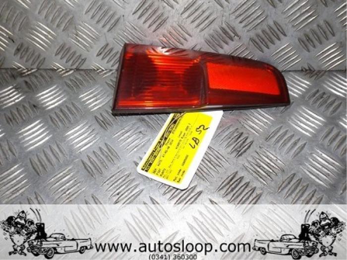Tailgate reflector, left from a Fiat Punto II (188) 1.2 16V 3-Drs. 2005