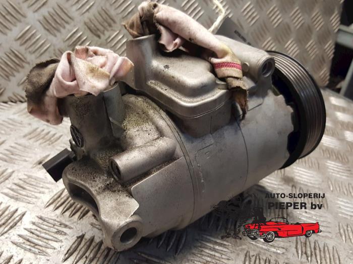 Air conditioning pump from a Volkswagen Golf Plus (5M1/1KP) 1.2 TSI BlueMOTION 2013