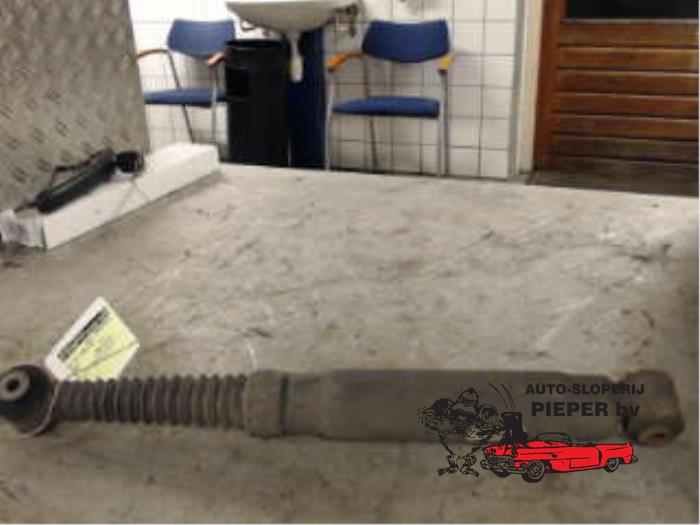 Rear shock absorber, left from a Peugeot 207 SW (WE/WU) 1.6 HDi 16V 2007