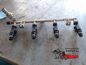 Used Fuel injector nozzle Opel Corsa C (F08/68) 1.4 16V Price € 52,50 Margin scheme offered by Autosloperij Pieper BV