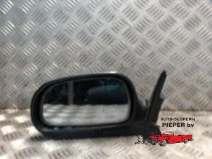 Used Wing mirror, left Toyota Corolla (E10) 1.3 XLi 16V Price € 26,25 Margin scheme offered by Autosloperij Pieper BV