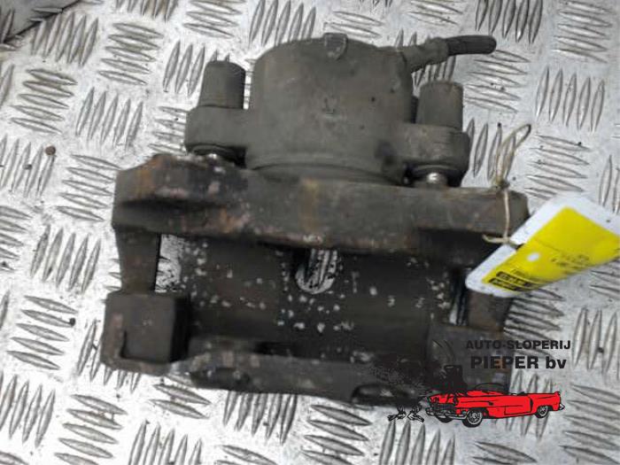 Front brake calliper, left from a BMW 5 serie Touring (E39) 525tds 1997