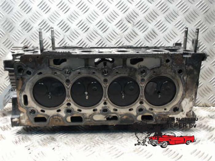 Cylinder head from a Ford Fiesta 5 (JD/JH) 1.4 TDCi 2006