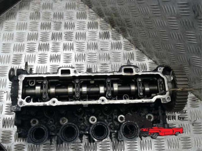 Cylinder head from a Ford Fiesta 5 (JD/JH) 1.4 TDCi 2006