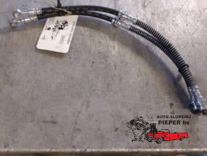 Used Front brake hose Mitsubishi Space Star (DG) 1.6 16V Price € 21,00 Margin scheme offered by Autosloperij Pieper BV