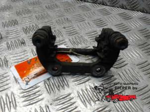 Used Rear brake calliperholder, left BMW 1 serie (E87/87N) 116i 1.6 16V Price € 15,75 Margin scheme offered by Autosloperij Pieper BV