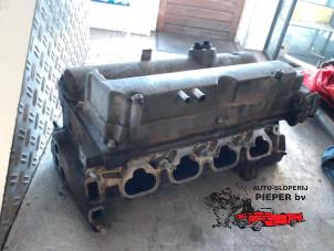 Used Cylinder head Opel Vectra B (36) 1.8 16V Ecotec Price € 157,50 Margin scheme offered by Autosloperij Pieper BV