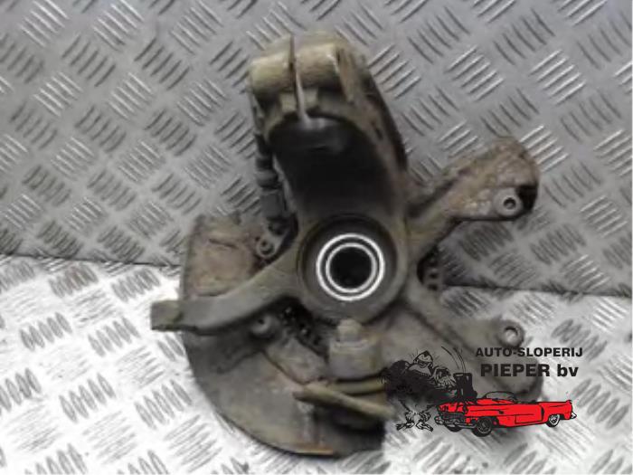 Knuckle, front left from a Volkswagen Bora (1J2) 2.0 1999