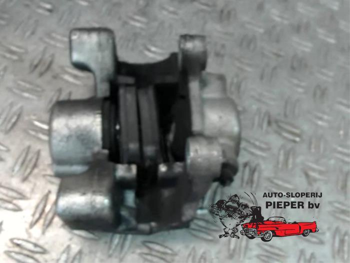 Rear brake calliper, left from a Opel Omega B (25/26/27) 2.5i V6 24V 2000