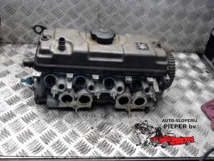 Used Cylinder head Peugeot 206 (2A/C/H/J/S) 1.1 XN,XR Price € 131,25 Margin scheme offered by Autosloperij Pieper BV
