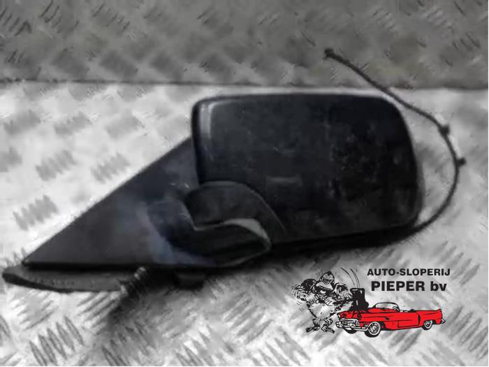 Wing mirror, left from a BMW 3 serie (E46/4) 316i 1999