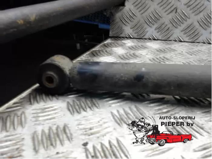 Rear shock absorber, left from a Mitsubishi Colt (Z2/Z3) 1.5 DI-D 12V HP 2005