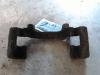 Front brake calliperholder, left from a BMW 3 serie Compact (E46/5), 2001 / 2005 316ti 16V, Hatchback, Petrol, 1.796cc, 85kW (116pk), RWD, N42B18A, 2001-06 / 2004-03, AT51; AT52 2002