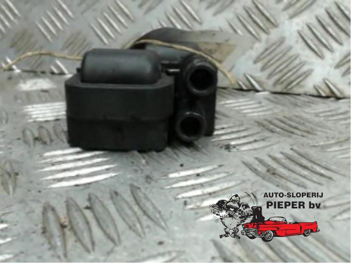 Ignition coil from a Mercedes-Benz 200-280 (W123) 280 1999
