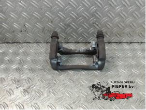Used Front brake calliperholder, left Nissan Micra (K12) 1.2 16V Price € 21,00 Margin scheme offered by Autosloperij Pieper BV