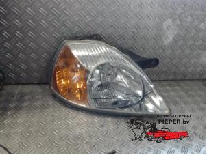 Used Headlight, right Kia Rio (DC22/24) 1.5 16V Price € 36,75 Margin scheme offered by Autosloperij Pieper BV