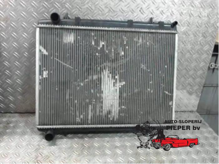 Used Radiator Citroen C4 Picasso (UD/UE/UF) 1.8 16V Price € 42,00 Margin scheme offered by Autosloperij Pieper BV