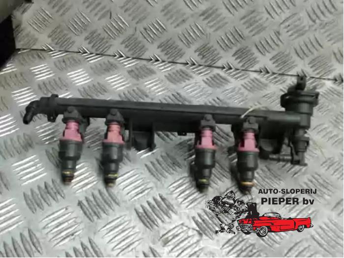 Usagé Système d'injection Toyota Corolla (E11) 1.3 16V Prix € 47,25 Règlement à la marge proposé par Autosloperij Pieper BV
