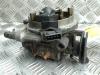 Throttle body from a Volkswagen Golf III (1H1) 1.6 i 1995