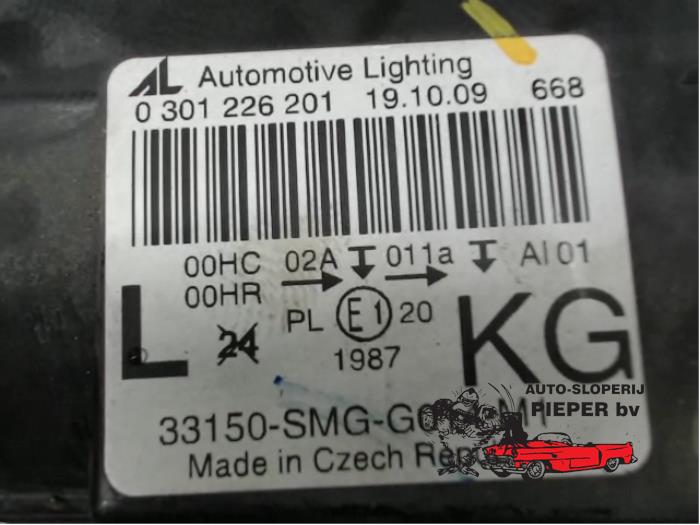 Reflektor lewy z Honda Civic (FK/FN) 1.8i VTEC 16V 2011