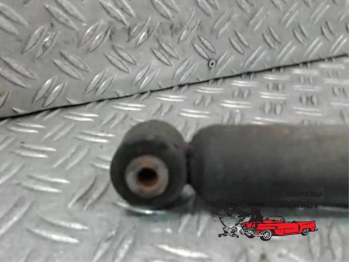Rear shock absorber, left from a Peugeot 107  2010
