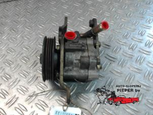 Used Power steering pump Nissan Micra (K11) 1.4 16V Price € 52,50 Margin scheme offered by Autosloperij Pieper BV
