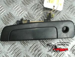 Used Door handle 2-door, left Mitsubishi Colt (CJ) 1.3 GL,GLX 12V Price € 15,75 Margin scheme offered by Autosloperij Pieper BV