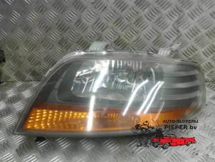 Używane Reflektor lewy Chevrolet Kalos (SF48) 1.4 16V Cena na żądanie oferowane przez Autosloperij Pieper BV