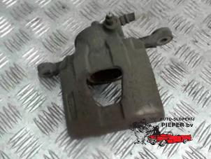 Used Front brake calliper, left Chevrolet Kalos (SF48) 1.4 16V Price on request offered by Autosloperij Pieper BV