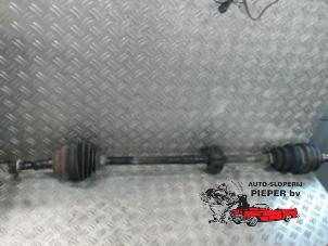 Used Front drive shaft, right Opel Astra G Caravan (F35) 2.2 16V Price on request offered by Autosloperij Pieper BV