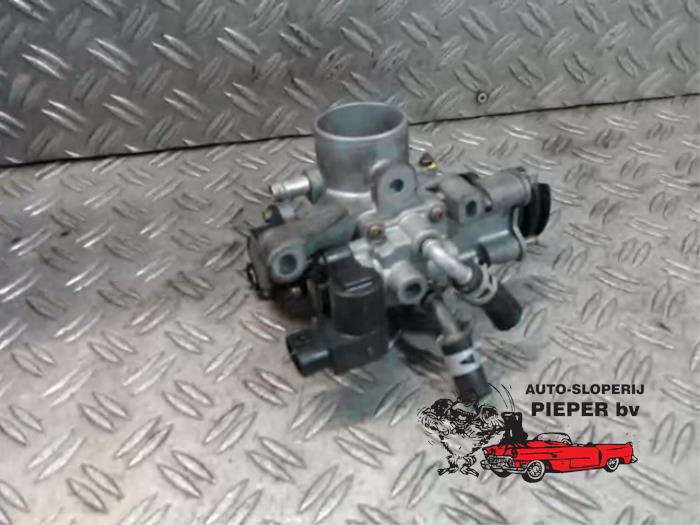 Begagnade Spjällhus Daihatsu Cuore (L251/271/276) 1.0 12V DVVT Pris € 52,50 Marginaltabell erbjuds av Autosloperij Pieper BV