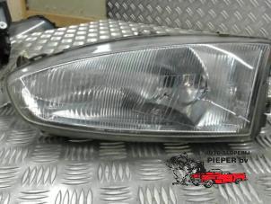 Used Headlight, left Mitsubishi Colt (CJ) 1.3 GL,GLX 12V Price € 31,50 Margin scheme offered by Autosloperij Pieper BV