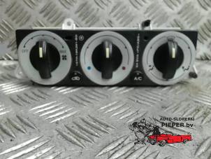 Usados Panel de control de calefacción Ford Mondeo III 1.8 16V Precio € 36,75 Norma de margen ofrecido por Autosloperij Pieper BV
