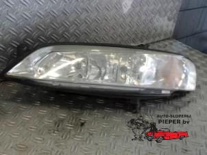 Used Headlight, left Opel Vectra B (36) 1.6 16V Ecotec Price € 36,75 Margin scheme offered by Autosloperij Pieper BV
