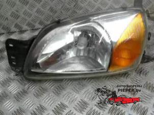 Używane Reflektor lewy Ford Fiesta 4 1.25 16V Cena € 26,25 Procedura marży oferowane przez Autosloperij Pieper BV